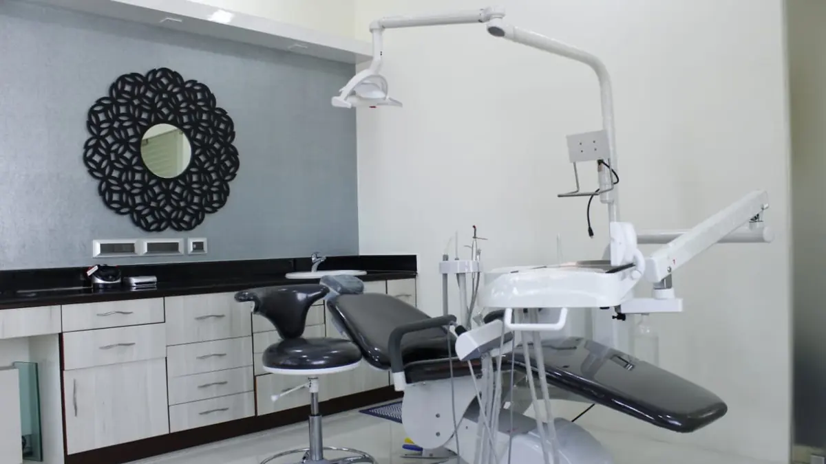 Treatment room with a dental chair at Dr. Kohila's Dental Centre